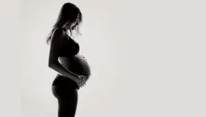 Black and White photo of a pregnant woman