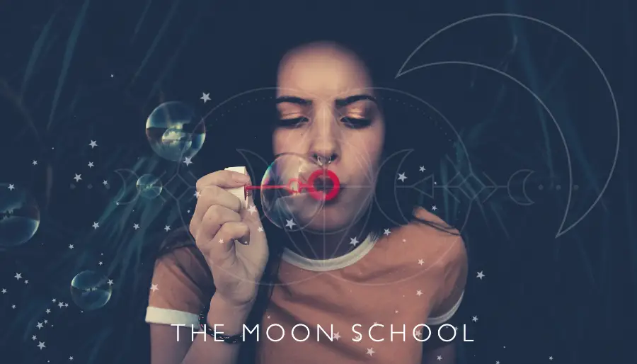 Woman with natal libra moon sign blowing bubbles with