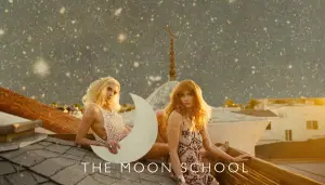 Boho spiritual women with waxing crescent Moon on rooftop