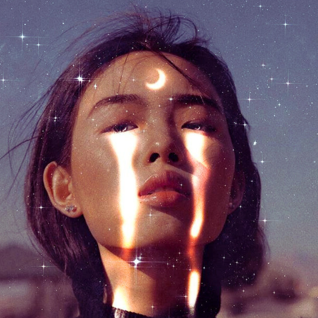 Beautiful asian woman with crescent Moon on forehead