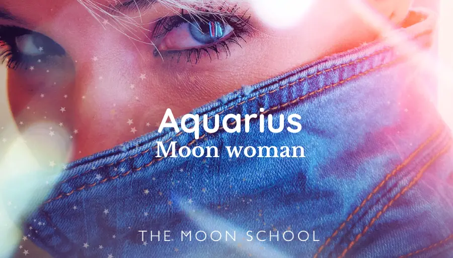 Women born with lunar Aquarius her eyes looking over a denim jacket