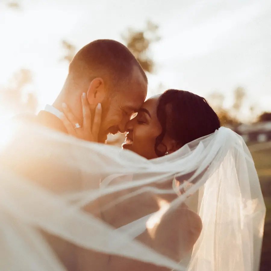 Husband and wife with veil