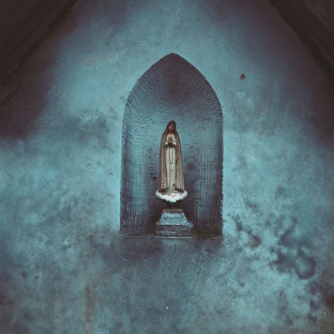 statue of virgin mary symbolising the Moon