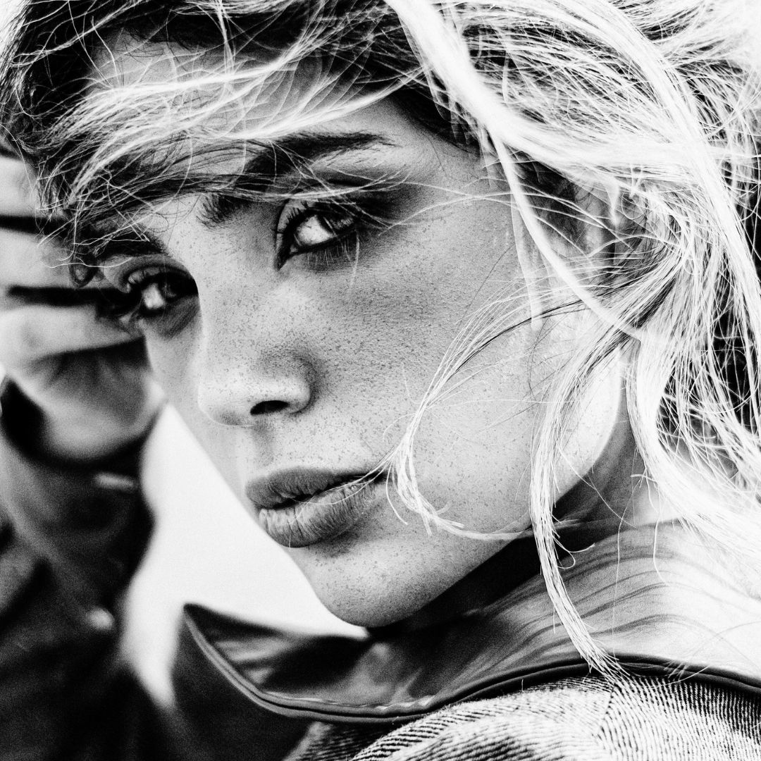 Black and white portrait of Fierce woman in her power looking to camera