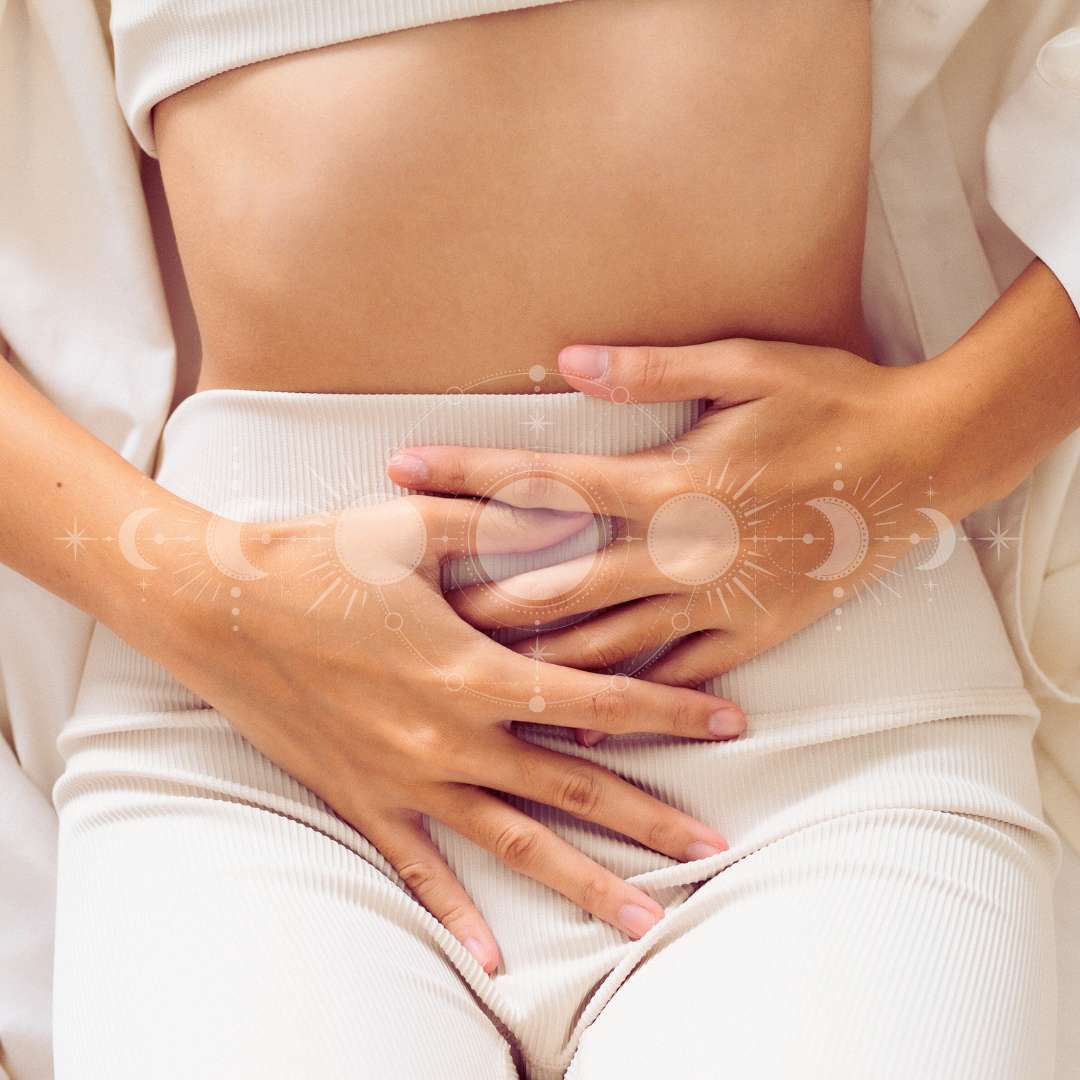 Woman holding her womb space with period on new moon