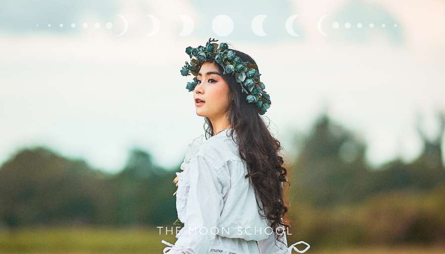 Women celebrating beltane with a flower crown