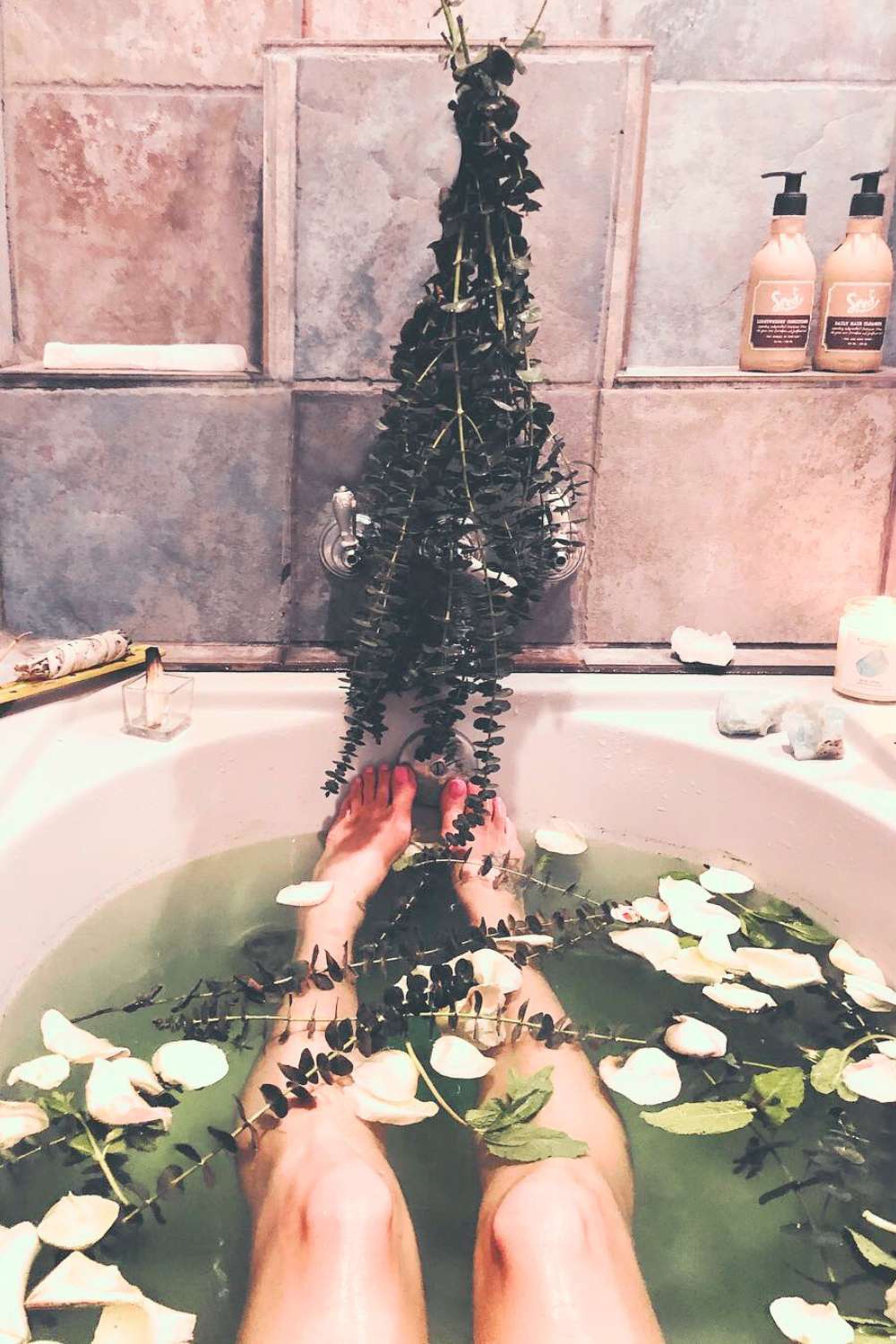 Example of a woman putting her feet up in a spiritual cleansing bath