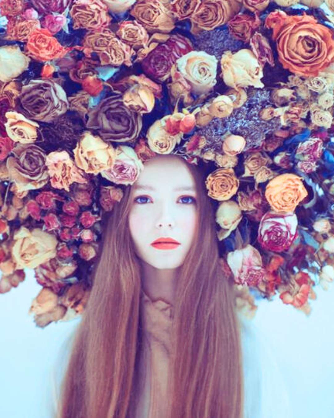 woman celebrating summer wearing a beautiful flower crown