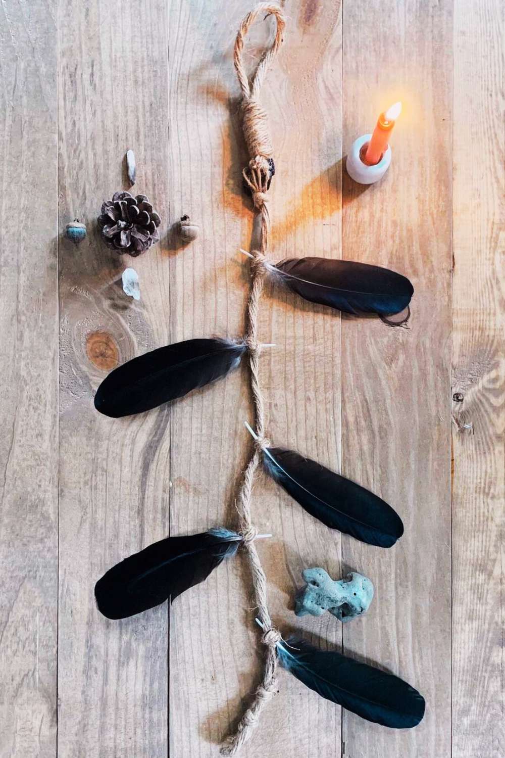 Witches ladder with feathers