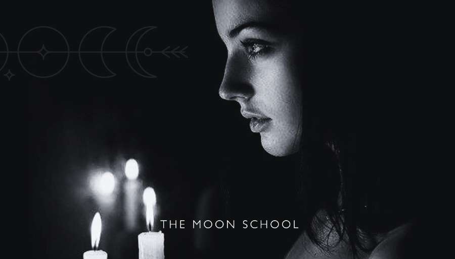 Witchy woman casting a protection spell with candle and incantation