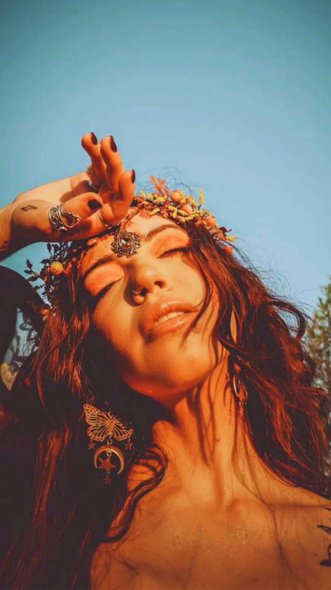 Mystic woman with jewellery and divine feminine style
