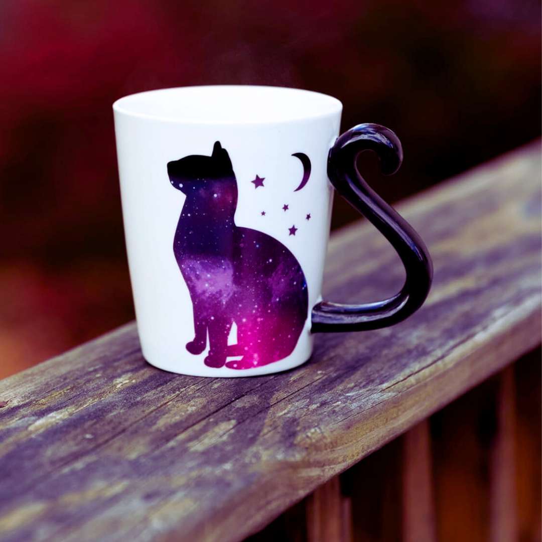 Witchy mug with a purple cat and moon and stars decoration, the ideal gift for a witch