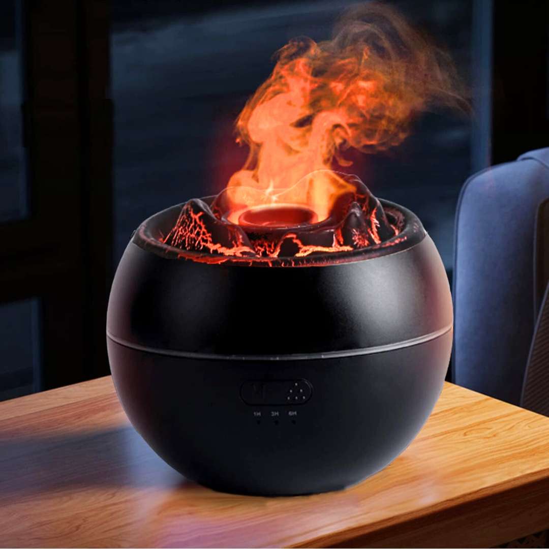 witch inspired essential oil diffuser in the shape of a cauldron with flames