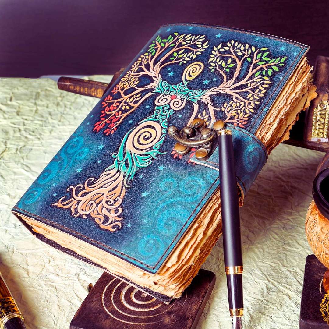 Handmade leather journal grimoire with turquoise cover and pagan design wiccan gift idea