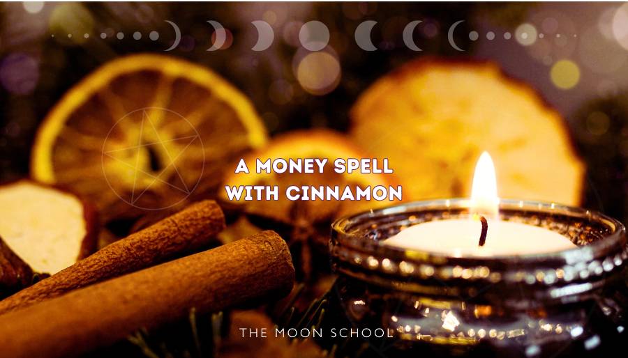candle magic altar with cinnamon sticks and dried orange, set up for a witchy money spell