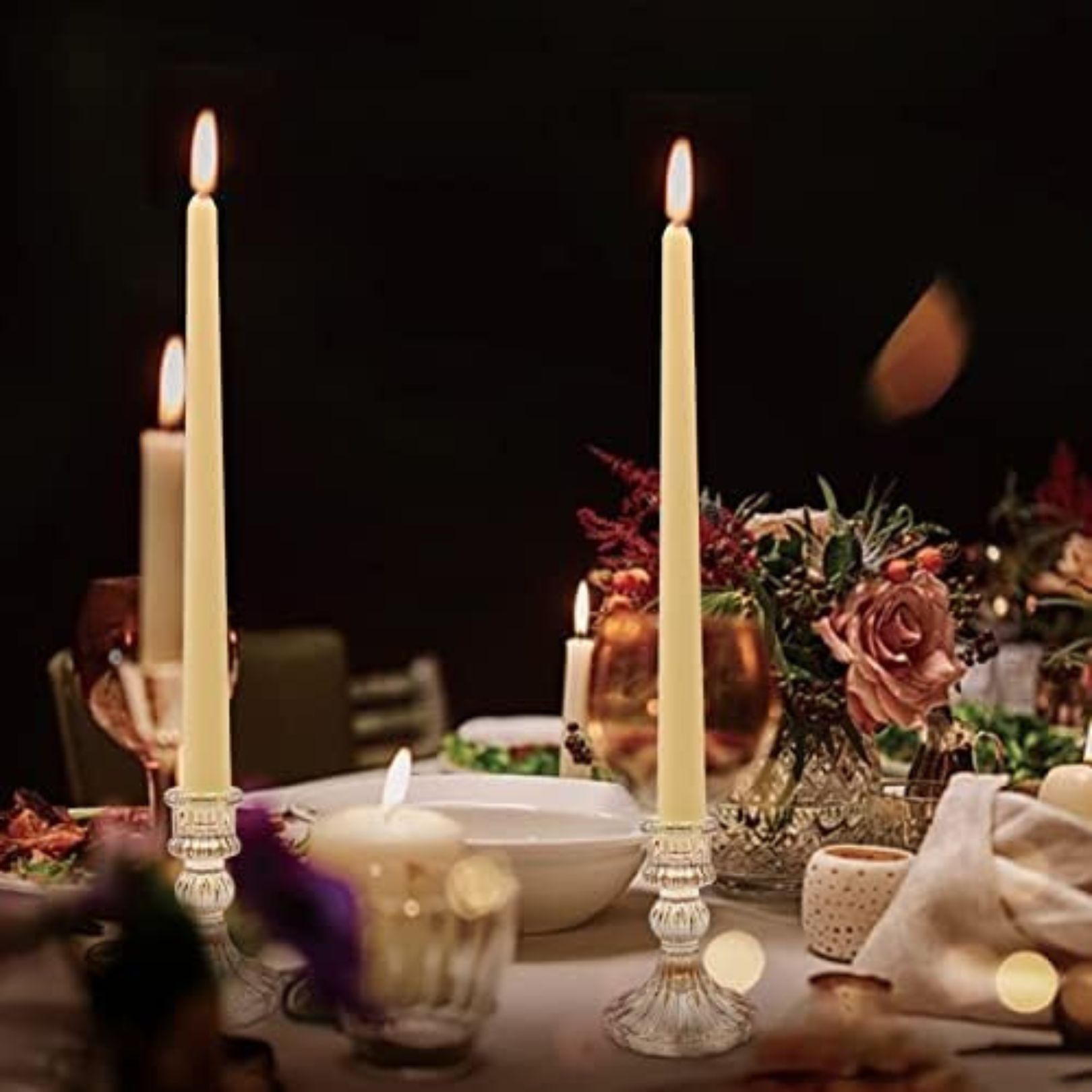 small glass crystal candle holders on a beautifully set witchy dinner table