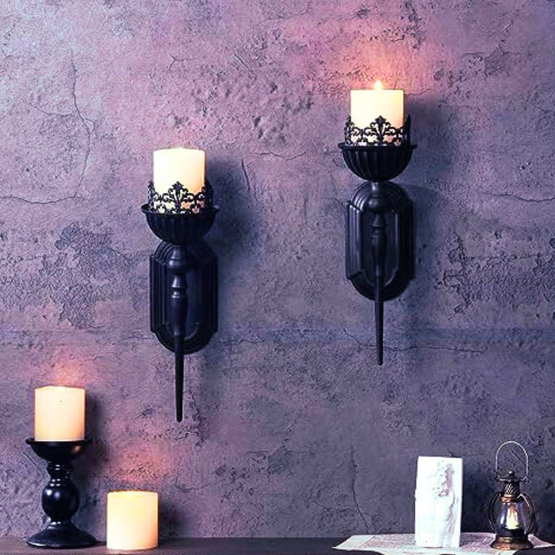 Pair of gothic style black wall sconces for pillar candles