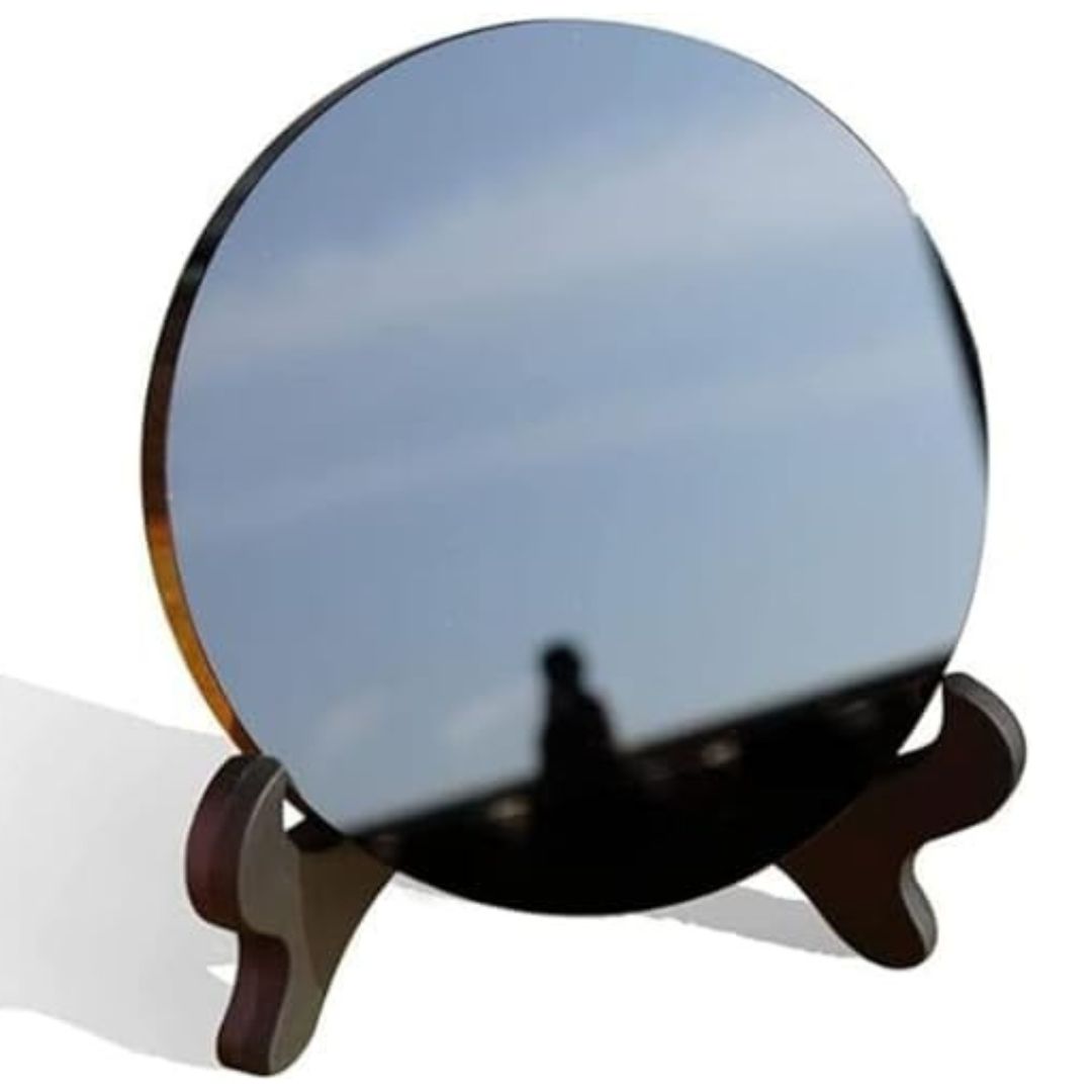 Witch's black scrying mirror with stand