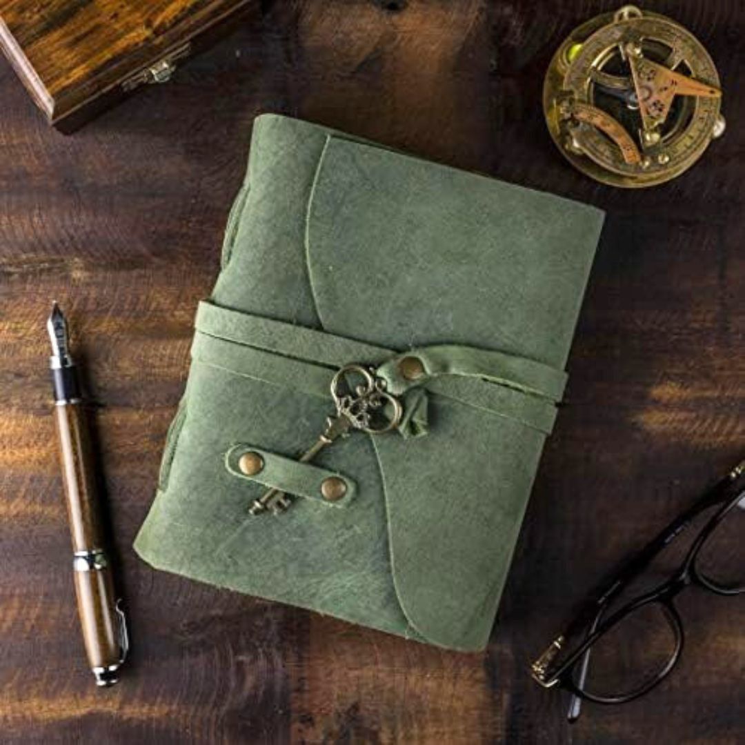 green leather bound witch grimoire 