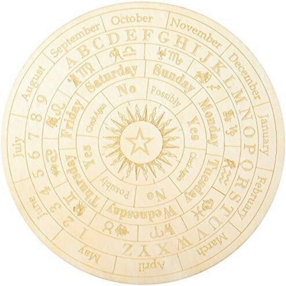wooden engraved sowsing board for a witch to use with a pendulum
