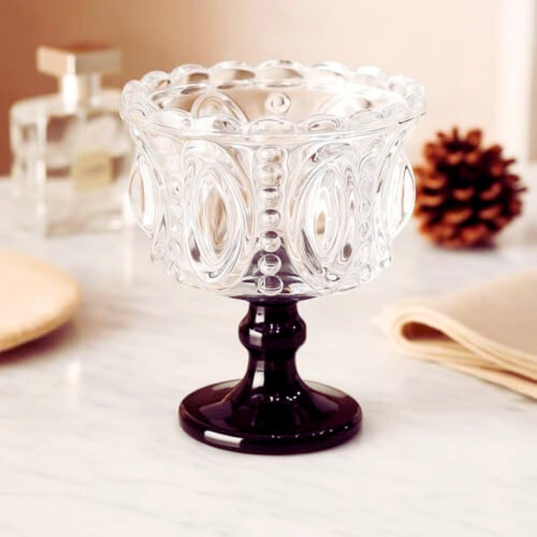 Vintage glass goblet with black stem witchy party decor accessory Vintage glass goblet with black stem witchy party decor accessory